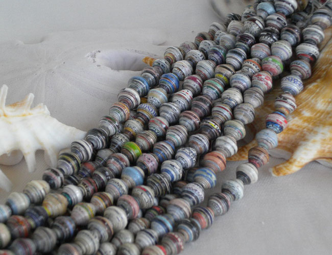 Strnds of 10 mm size paper beads