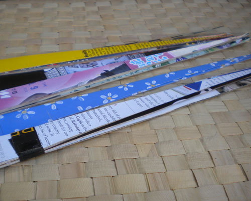 Strips of old magazines cut into triangles